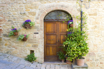 Fototapeta na wymiar lovely tuscan doors, Volterra, Italy