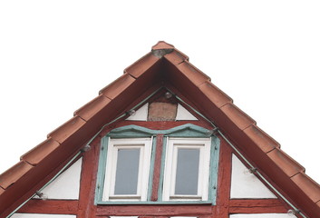 Hausgiebel mit rotem Fachwerk