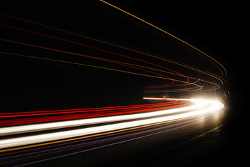 Car light trails in the tunnel.