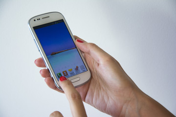 Woman hands holding a Smartphone