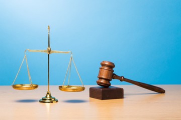 Lawyer. Law scales, judge gavel on table. Symbol of justice.