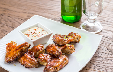 Baked chicken wings with spicy sauce