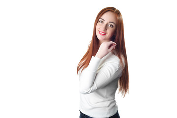 Portrait of a redhead women in white sweater isolated on white b