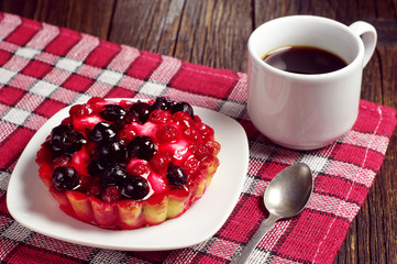 Coffee and cake with berries
