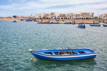 Fototapeta na wymiar Boat with bicycle inside in Rabat