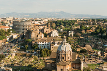 Fototapeta na wymiar Panorama of Roman Forum ruins and Colosseum, Italy