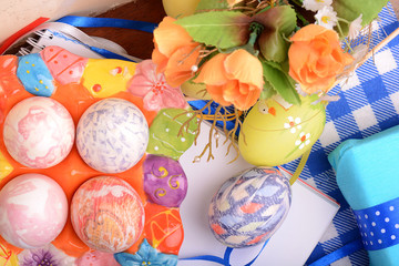 Easter setting with gift box and spring decoration
