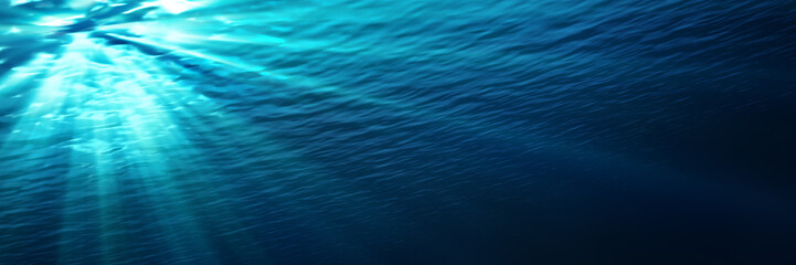 Naklejka premium pod wodą - niebieski świeci w głębi morza