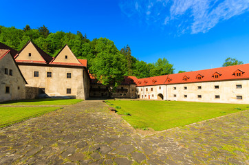 Fototapeta na wymiar Red monastery in Spis village on bank of Dunajec river, Slovakia