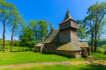 Fototapeta na wymiar Old wooden church near Szczawnica in Pieniny Mountains, Poland