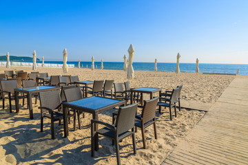 Chairs on beach in Sopot town in summer, Baltic Sea, Poland - obrazy, fototapety, plakaty