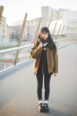 young beautiful asian hipster woman