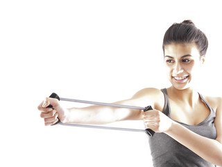 girl stretching resistance band