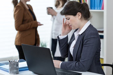 Worker of corporation having migraine