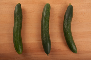 Cucumbers on wooden table