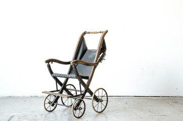 Fototapeta na wymiar old vintage style stroller in vintage room