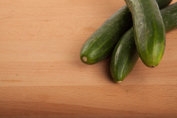 Cucumbers on wooden table