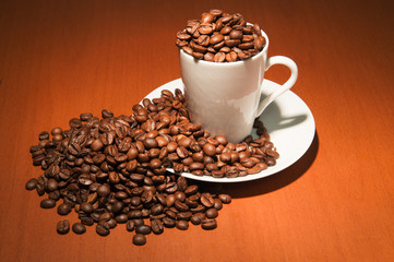 Coffee beans in white cup