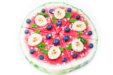 Watermelon pizza on white