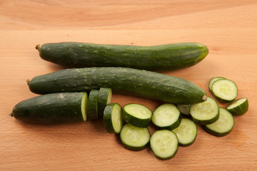 Cucumbers on wooden table