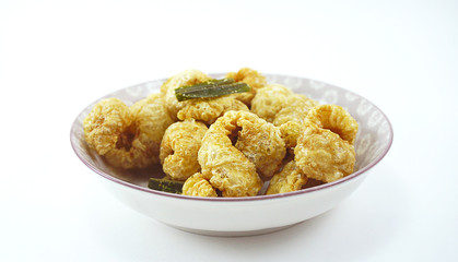 pork snack on the purple plate isolated