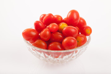 Red cherry tomatoes in a bowl