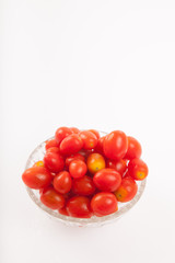 Red cherry tomatoes in a bowl