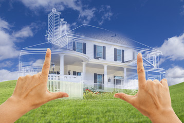 Female Hands Framing House Drawing and House Above Grass