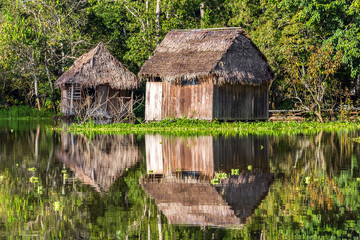 Shacks Reflected in the Amazon