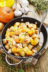 Chicken stew with pumpkin, potatoes and spices
