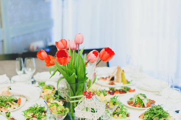 Red Tulips on Festive Table
