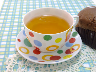 tea and chocolate bread on blue table cloth