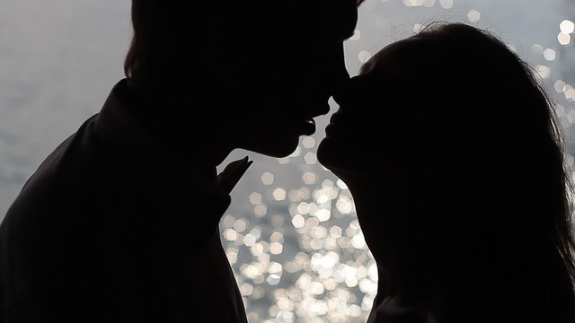 Silhouette of a kiss in slow motion