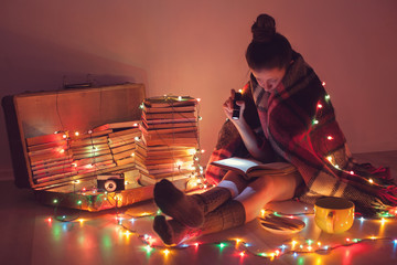 Well-read girl at home. Night exciting reading