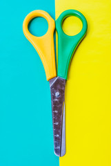 scissors on colored background