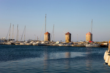 entrance to the harbor of Rhodes, Greece, behind  three towers