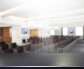 Fototapeta premium Table Top And Blur Office Background