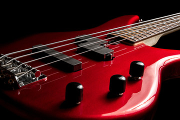 Bass guitar close-up. Photo in low key
