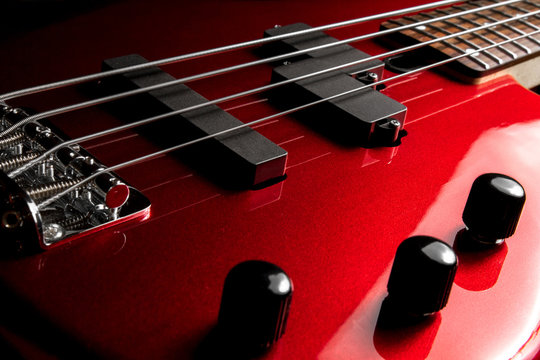 Bass guitar close-up. Photo in low key