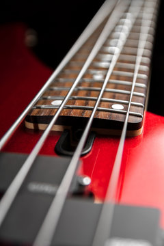 String bass guitar close-up. Photo in low key