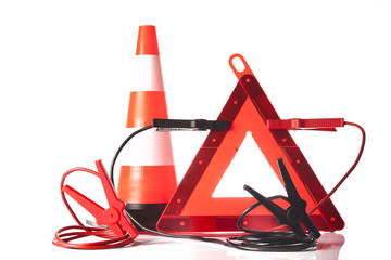 warning triangle and traffic cone with jump start cable