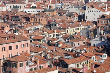 Fototapeta na wymiar houses with red-tile roofs and bricks in southern Europe