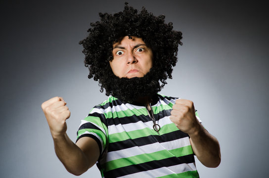 Funny man with afro hairstyle isolated on white