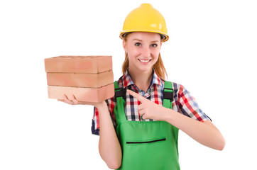 Woman with bricks isolated on white