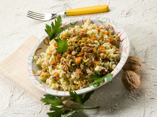 couscous with bacon carrot dried grape and nuts