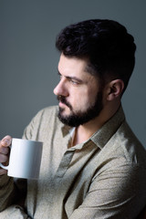 Beard man is drinking coffee - 80798265