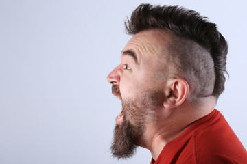 portrait of a man with a mohawk