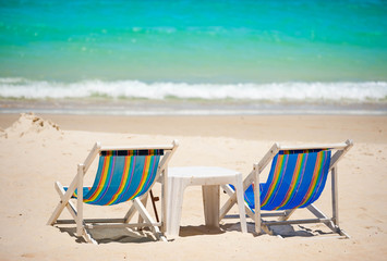 Beach and chair on sand beach.