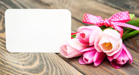 tulips with a card