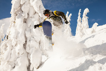 Snowboarder at jump